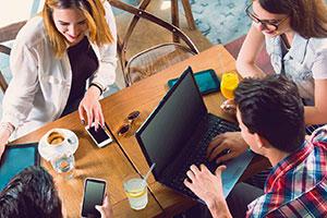 Nonprofit employees using Office 365 on laptops and mobile devices